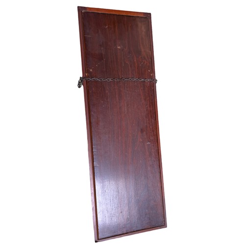 1354 - A mahogany framed bevel edged wall mirror. 79 x 26cm.