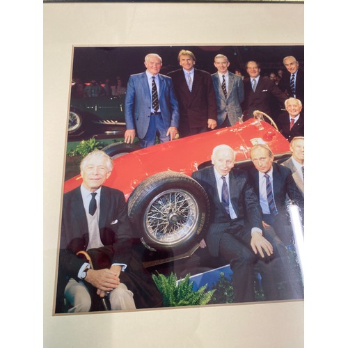 851B - A framed photograph of 13 Ferrari  drivers taken at the Essen Motor show in 1995. Luigi Villoresi se... 