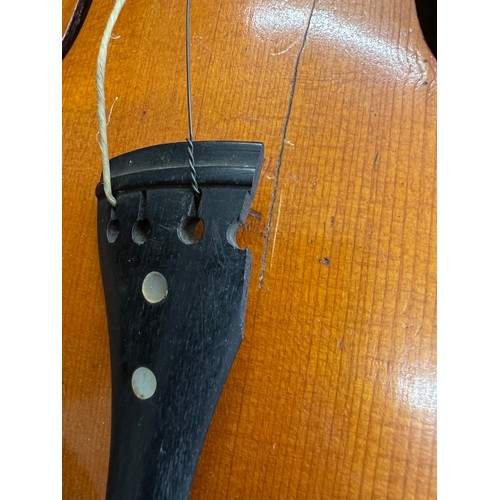 766 - Violin (in need of restoration) and case along with a round tin. Round tin contains spares for both ... 