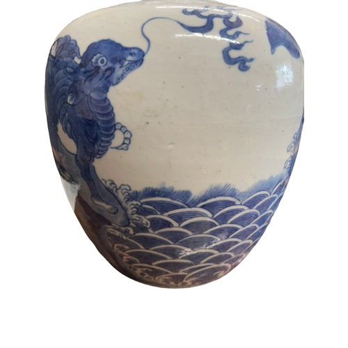 133 - A Chinese porcelain blue and white ginger jar 22cm h with carved hardwood cover, possibly Kangxi.