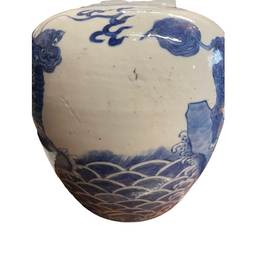 133 - A Chinese porcelain blue and white ginger jar 22cm h with carved hardwood cover, possibly Kangxi.