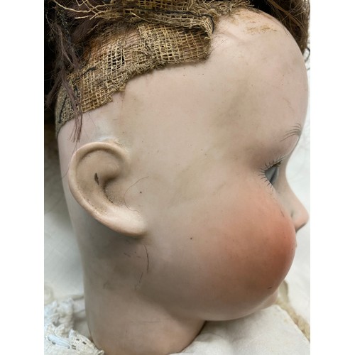 713 - Schoenau and Hoffmeister 1909 bisque headed doll with brown sleeping eyes and open mouth.  60cm h.