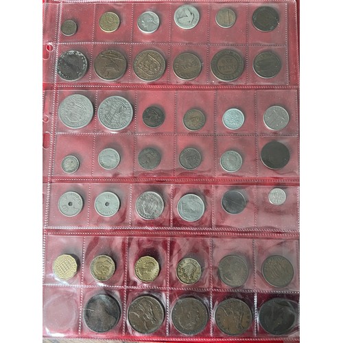 452 - An album collection of British coins to includes sixpences (4 x pre 1947), shillings, crowns, one pe... 