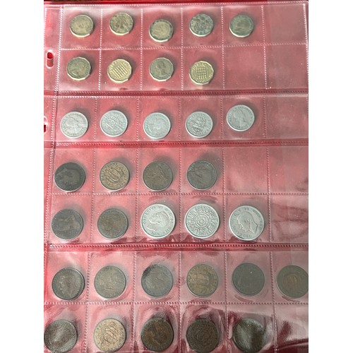 452 - An album collection of British coins to includes sixpences (4 x pre 1947), shillings, crowns, one pe... 