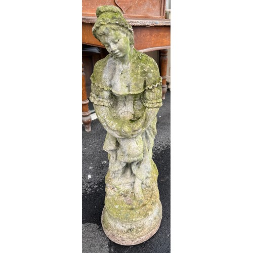 1359A - A reconstituted stone female figure. 84cm h.