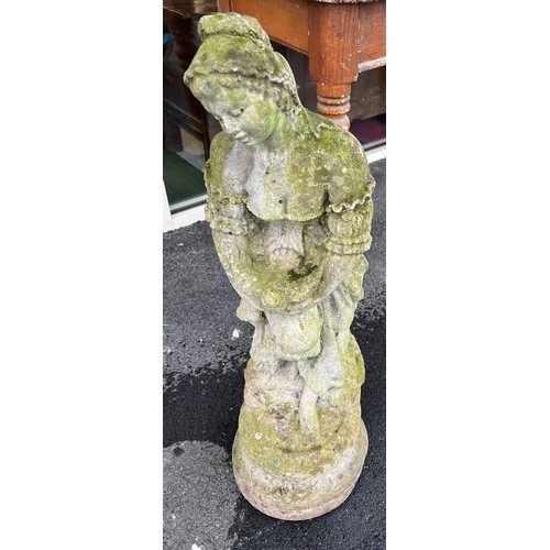 1359A - A reconstituted stone female figure. 84cm h.