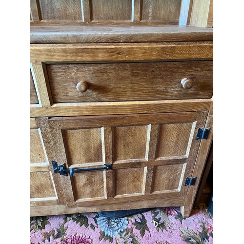 175A - Peter Heap Rabbitman oak Dresser raised back with open shelves, two drawers and cupboards under, and... 