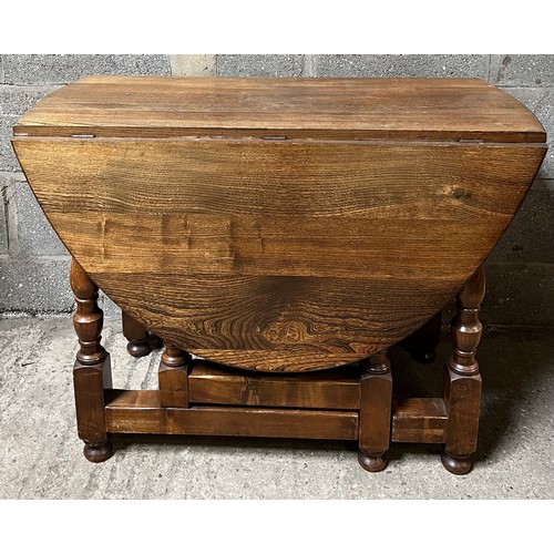 161 - An oak drop leaf table. 137 w x 100cm extended. 73cm h.