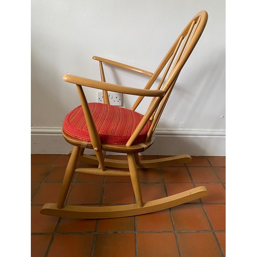 179 - A 1960's blonde Ercol rocking chair 85cm h.