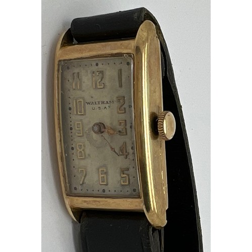 924 - A 9ct gold Waltham wristwatch on leather strap.