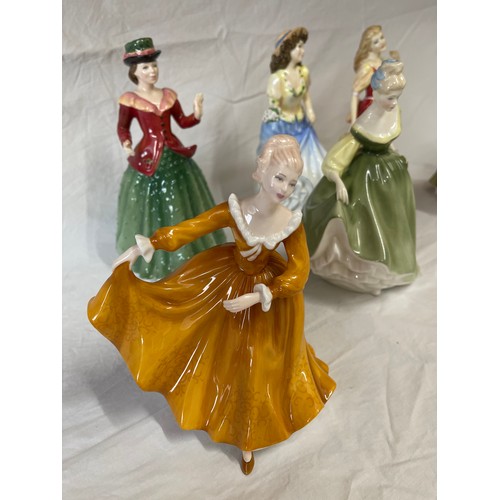 410 - Six Royal Doulton figurines to include :
‘Fair Lady’ HN 2193, ‘Kirsty’, ‘Holly’ HN 3647, ‘Emily’ HN ... 