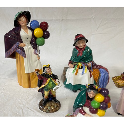 412 - A collection of Royal Doulton figurines to include:Balloon Lady HN 2935 22cm h, Balloon Man HN 1954,... 