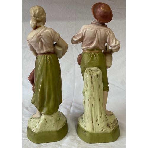 415 - A pair of Royal Dux Bohemian figures. 18.5cm h.