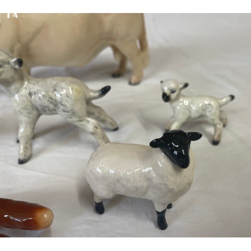 417 - Six Beswick animal figurines to include: cream bull 23cm l, giraffe, 2 x lambs 5cm and 8cm h, fox an... 