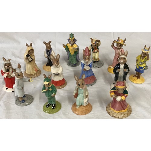 424 - A collection of Royal Doulton 'Bunnykins' to include: Shopper, Fortune Teller, Lawyer, Tourist, Morr... 