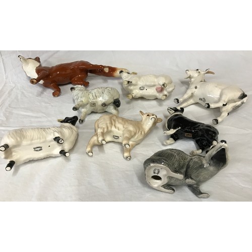 428 - A collection of 7 Beswick animal figures to include 3 x sheep, 1 x fox, 1 x calf, 1 x badger and a s... 