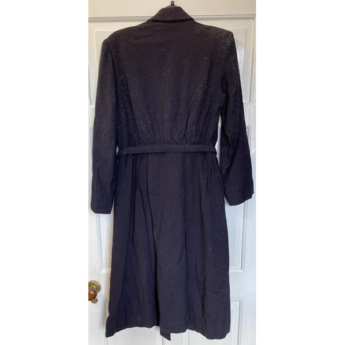 730 - Three vintage clothing items to include a navy long belted coat by Marlbeck Model, blue cotton smock... 