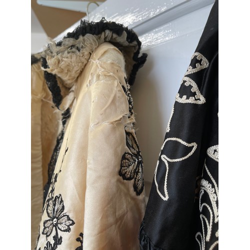 732 - A collection of vintage capes and tops to include 1 x black silk cape with white embroidered flowers... 