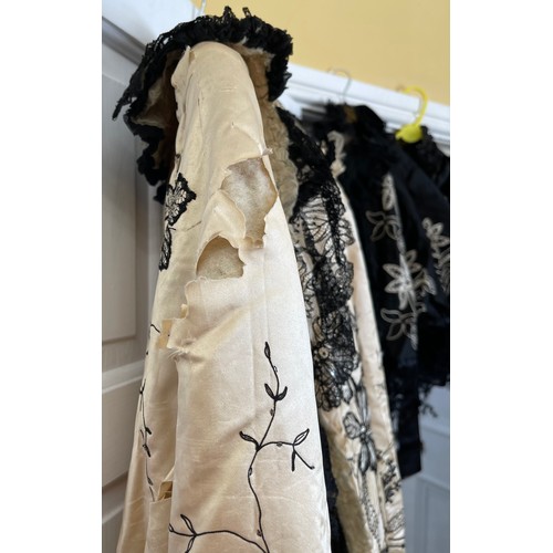 732 - A collection of vintage capes and tops to include 1 x black silk cape with white embroidered flowers... 