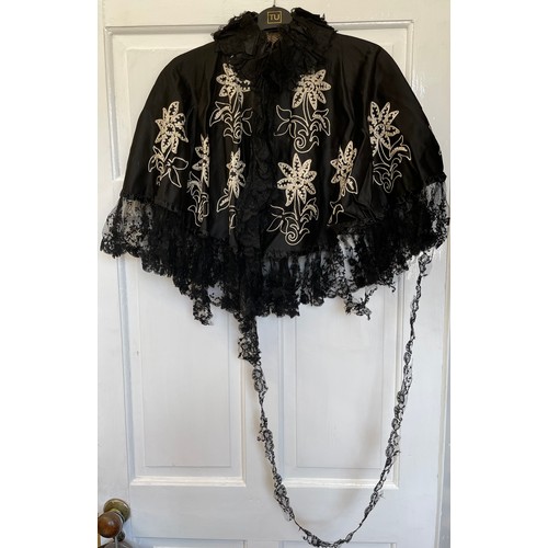 732 - A collection of vintage capes and tops to include 1 x black silk cape with white embroidered flowers... 