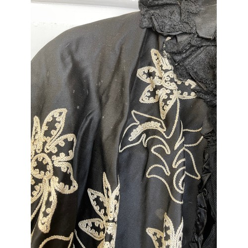 732 - A collection of vintage capes and tops to include 1 x black silk cape with white embroidered flowers... 