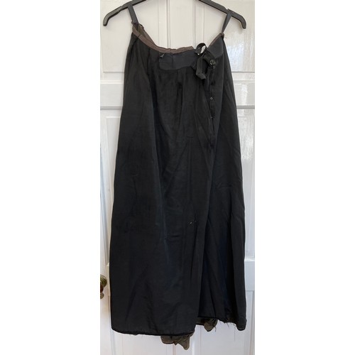 735 - A black Victorian long overskirt with black and white checked silk apron pinny together with a small... 