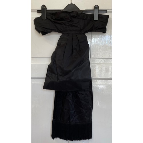 735 - A black Victorian long overskirt with black and white checked silk apron pinny together with a small... 