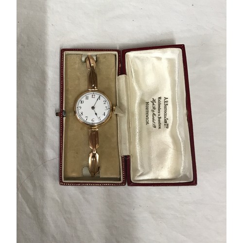 926 - Vintage wrist watch with a 9ct gold strap.