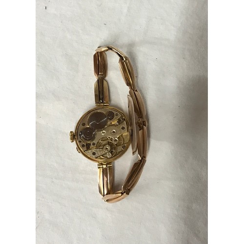 926 - Vintage wrist watch with a 9ct gold strap.