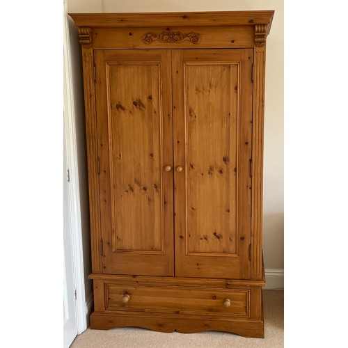 158 - A pine 2 door wardrobe. 200 h x 118 w x 60cm d.