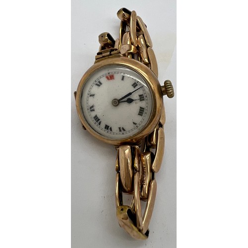 928 - A 9ct gold ladies wristwatch with expanding 9ct bracelet. 24.2gm.