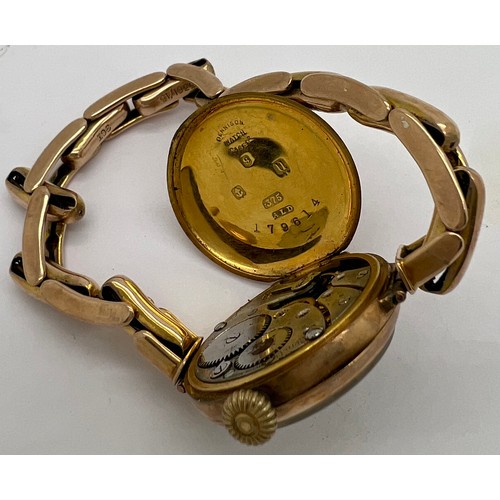 928 - A 9ct gold ladies wristwatch with expanding 9ct bracelet. 24.2gm.