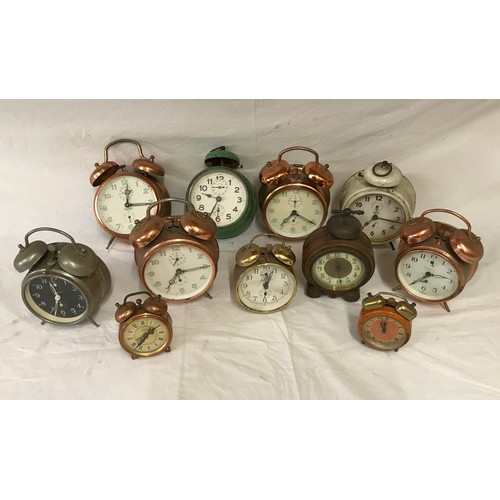 1051 - Collection of eleven Bell alarm clocks.