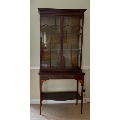 191 - An Edwardian mahogany and inlaid display cabinet, 2 glazed doors over 2 drawers. 201 h x 89 w x 42cm... 