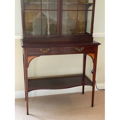 191 - An Edwardian mahogany and inlaid display cabinet, 2 glazed doors over 2 drawers. 201 h x 89 w x 42cm... 