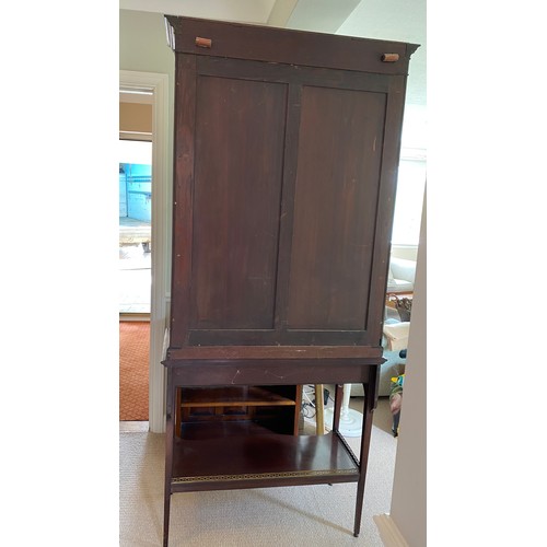 191 - An Edwardian mahogany and inlaid display cabinet, 2 glazed doors over 2 drawers. 201 h x 89 w x 42cm... 