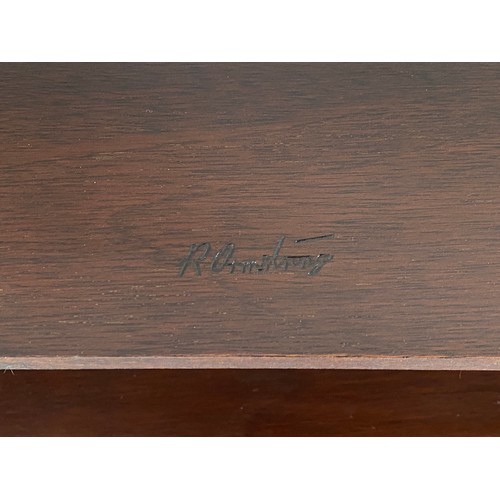 199 - A mahogany wall shelf with fretted sides. Marked R. Armstrong to base.