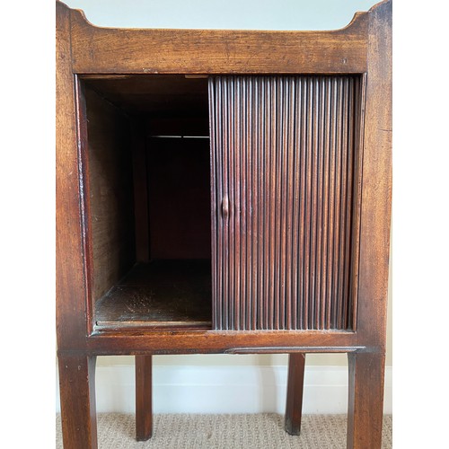 200 - A Georgian mahogany washstand, single tambour sliding door, galleried top with 2 handles.