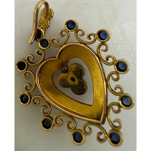 655 - Heart shaped pendant in unmarked yellow metal set with sapphires, seed pearl and tiny diamond. Appro... 