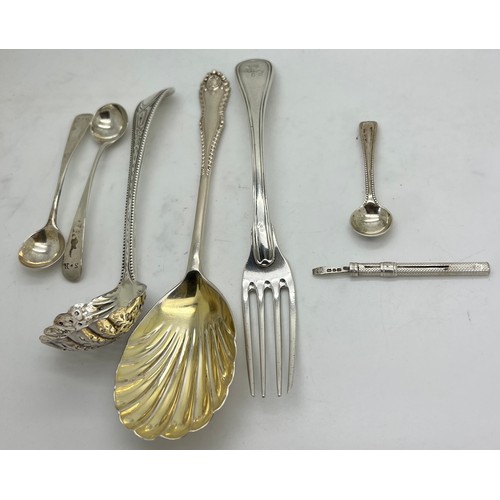 838 - Silver cutlery to include a pair of Georgian salt spoons, Victorian salt spoon, Victorian sifter spo... 