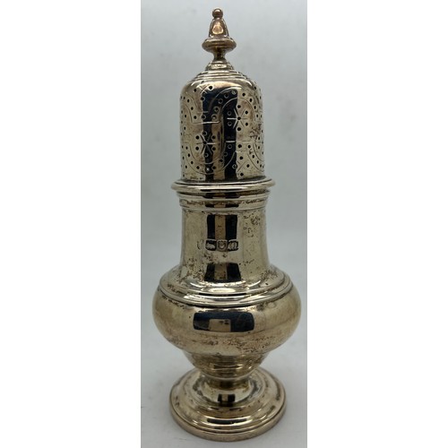 846 - A silver pepperette  London 1908, makers mark rubbed. 134gm. 15.5cm h.