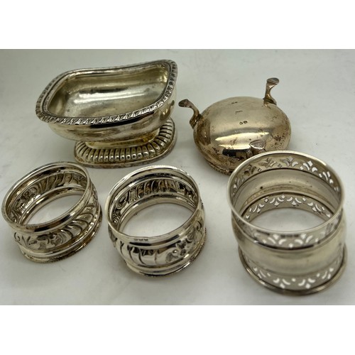 852 - Silver to include Georgian salt, marks rubbed, Victorian salt London 1875 maker RH and 3 napkin ring... 