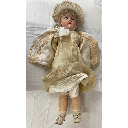 969 - A early 20th Century Max Handwerck Germany 9 1/2 bisque socket head doll, with blue glass sleeping e... 