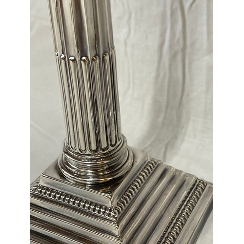 857 - A pair of silver Corinthian column stepped candlestick holders, Birmingham 1956 AS 30.5cms h. 2103 g... 