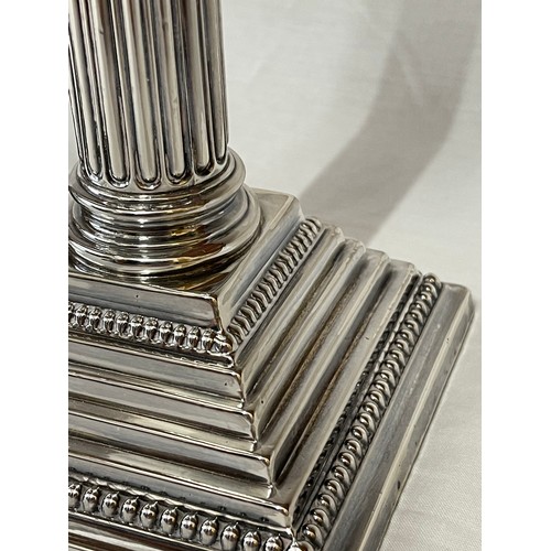 857 - A pair of silver Corinthian column stepped candlestick holders, Birmingham 1956 AS 30.5cms h. 2103 g... 