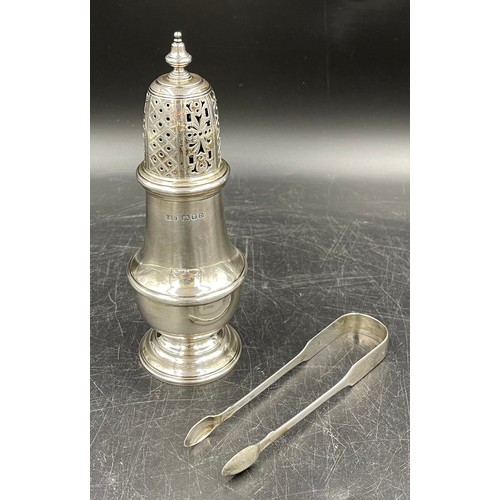 858 - A silver sugar sifter London 1939 A&H 19.5cms h together with silver sugar tongs London 1822 G.T.T.B... 