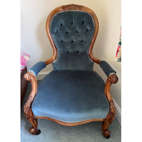 181 - A 19th Century walnut framed open armchair.