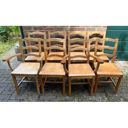 175D - Eight Acorn Man wavy ladder back dining chairs to include 2 carvers, all with leather seats.