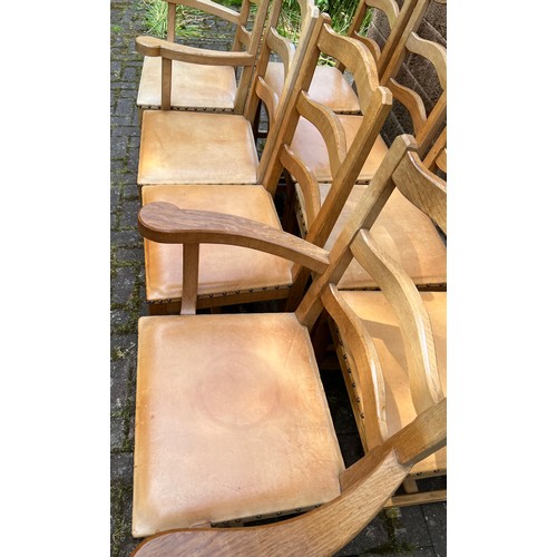 175D - Eight Acorn Man wavy ladder back dining chairs to include 2 carvers, all with leather seats.