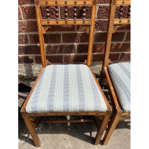 187 - A pair of oak and inlaid aesthetic movement side chairs.